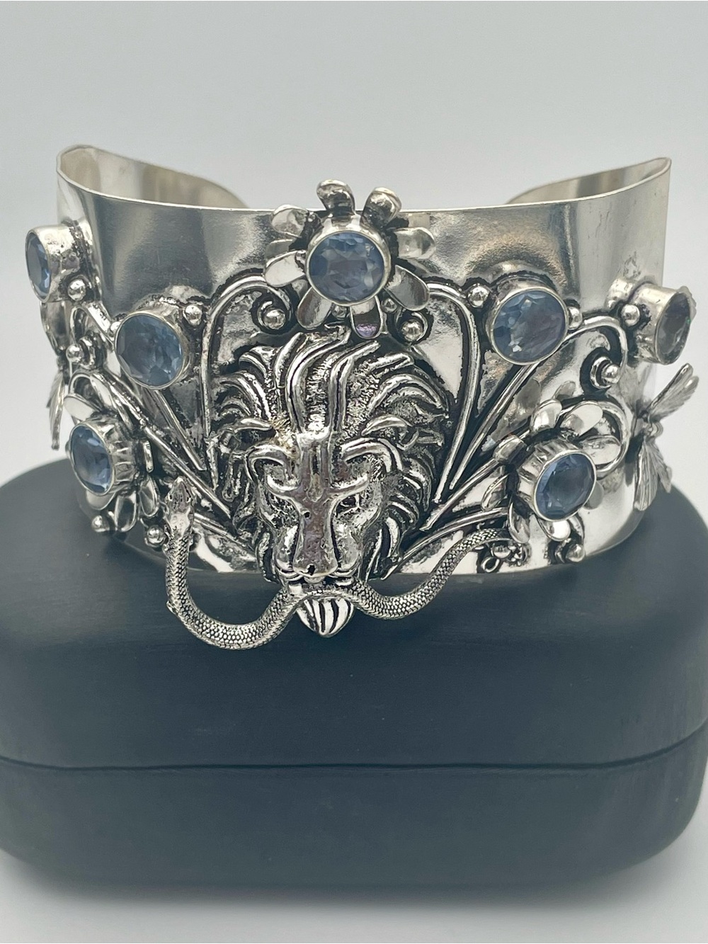 Silver Lion Head Cuff Bracelet with Sapphire Blue Gem Accents. Size 8